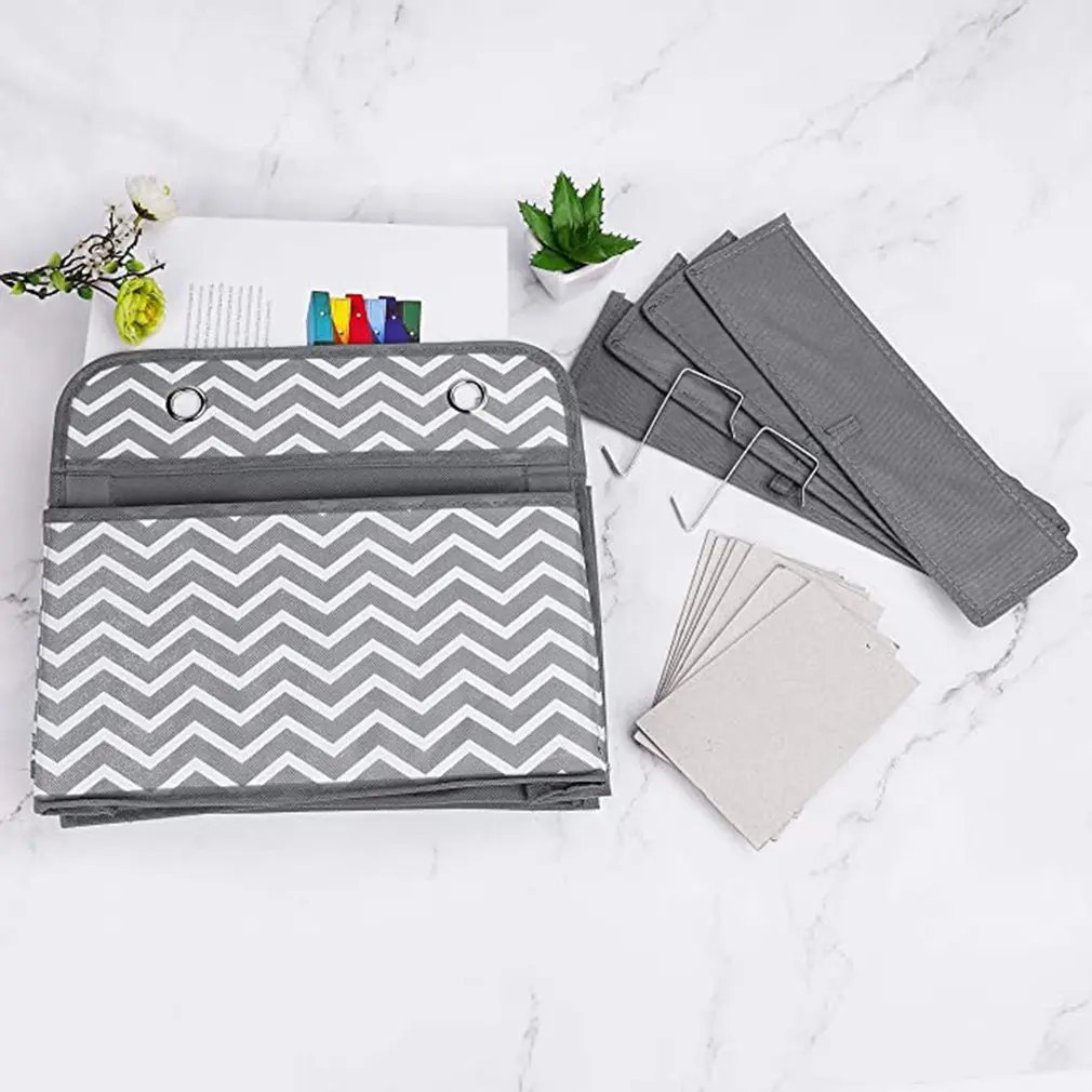

Wardrobe Hanging Storage Bag with 4 pockets Foldable hanging storage with 2 hooks for towels, underwear, socks, magazine, gray