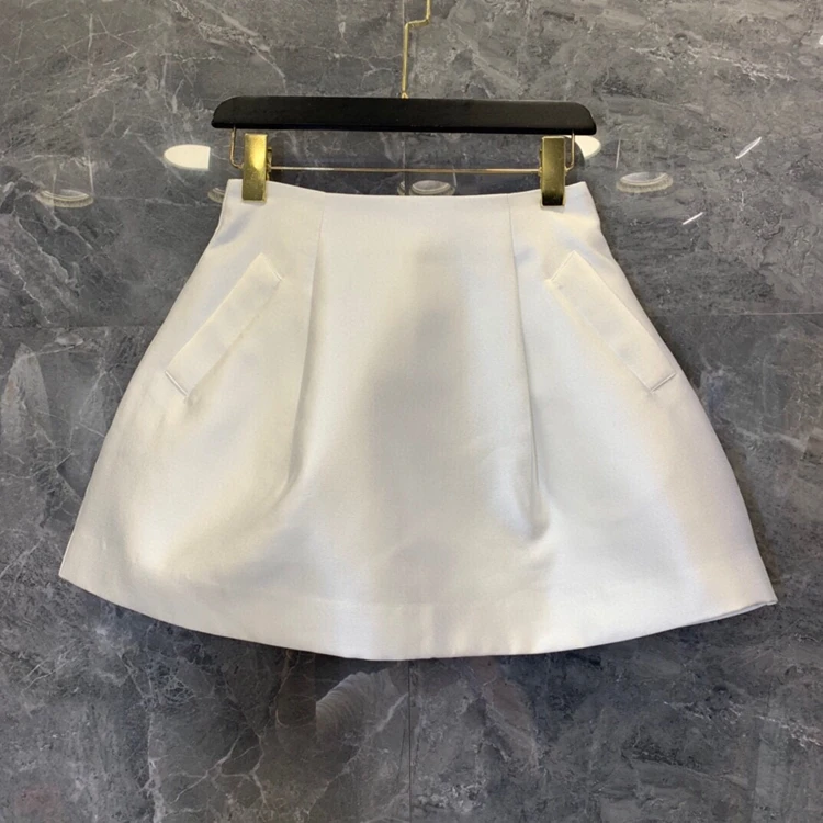 

2021 spring and summer new women's pure color decoration oblique symmetrical pocket A-line all-match short skirt 327