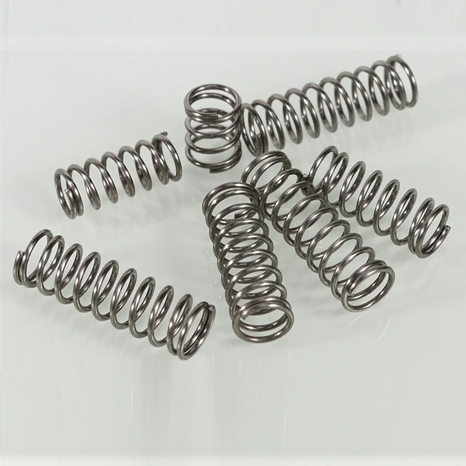 

1.6x13mm Compressed Springs, 1.6mm Wire Diameter x 13mm Outer Diameter x (15-50)mm Free Length, Spring Steel Compressed