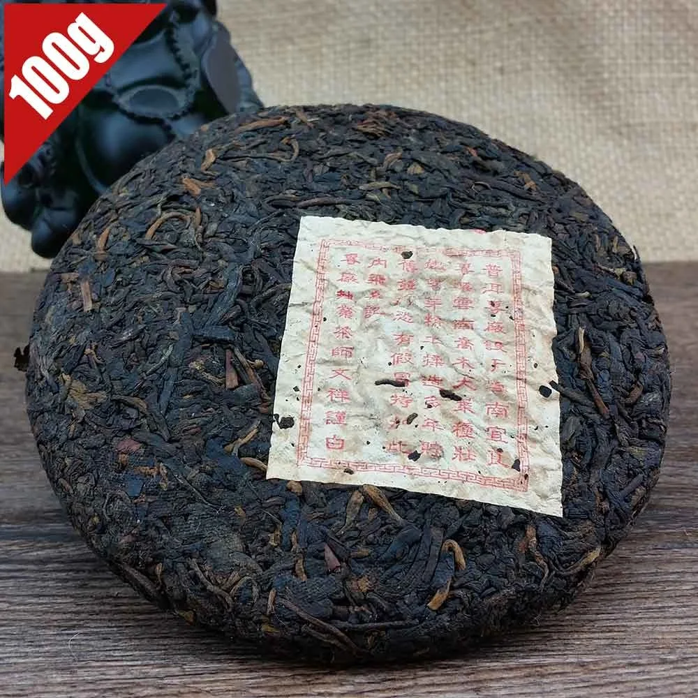 

2010 Yunnan Shu Pu-erh Tea Cake Pu-erh Tea 100g Old Long Yu Ripe Pu-erh