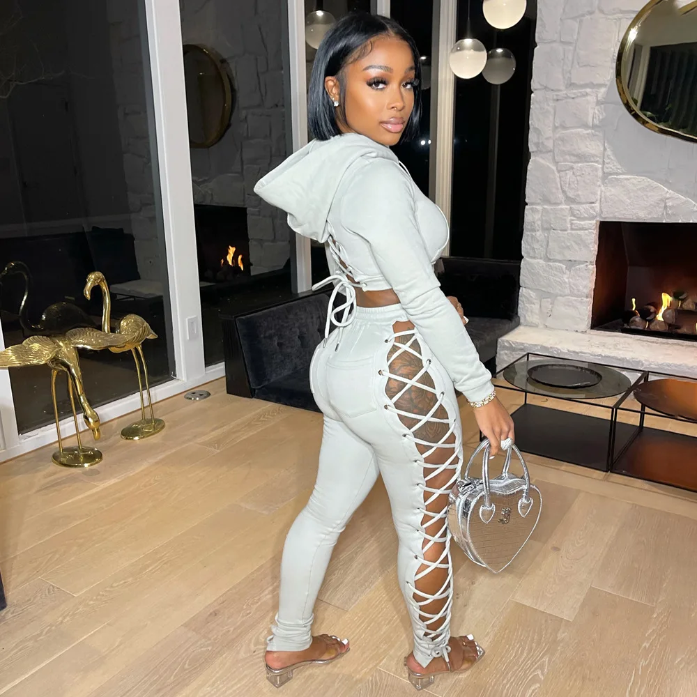 

Ronikasha Women Sexy Two Piece Sets Back Cross Lace Up Hoodie Top and Drawstring Hollow Out Pants Set