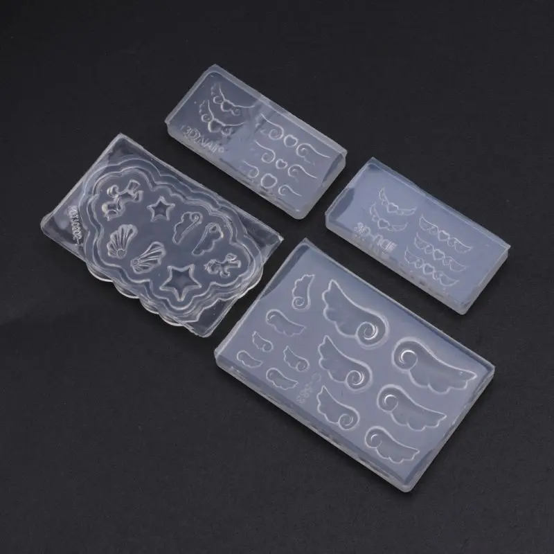 

4Pcs Mini Heart Resin Earring Pendant Mold Nail Art Template Silicone Mold 203B