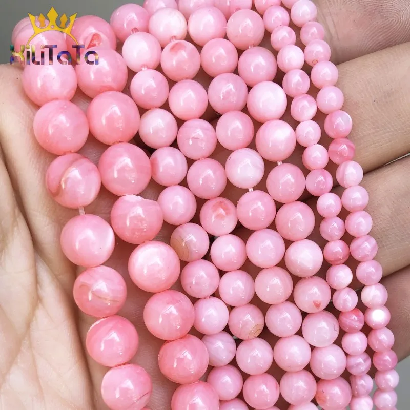 Розовые пресноводные ракушки россыпью бусины гладкие круглые камни для