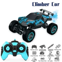 new 116 arrival light climbing rc car with spray function mountain bigfoot 4wd remote control car toy stunt rock off road vehic