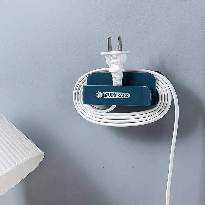 

Self-Adhesive Wall Mounted Plug Hanger Cable Clip Organizer Multi-Function Phone Holder Remote Control Stand Cord Winder Holder