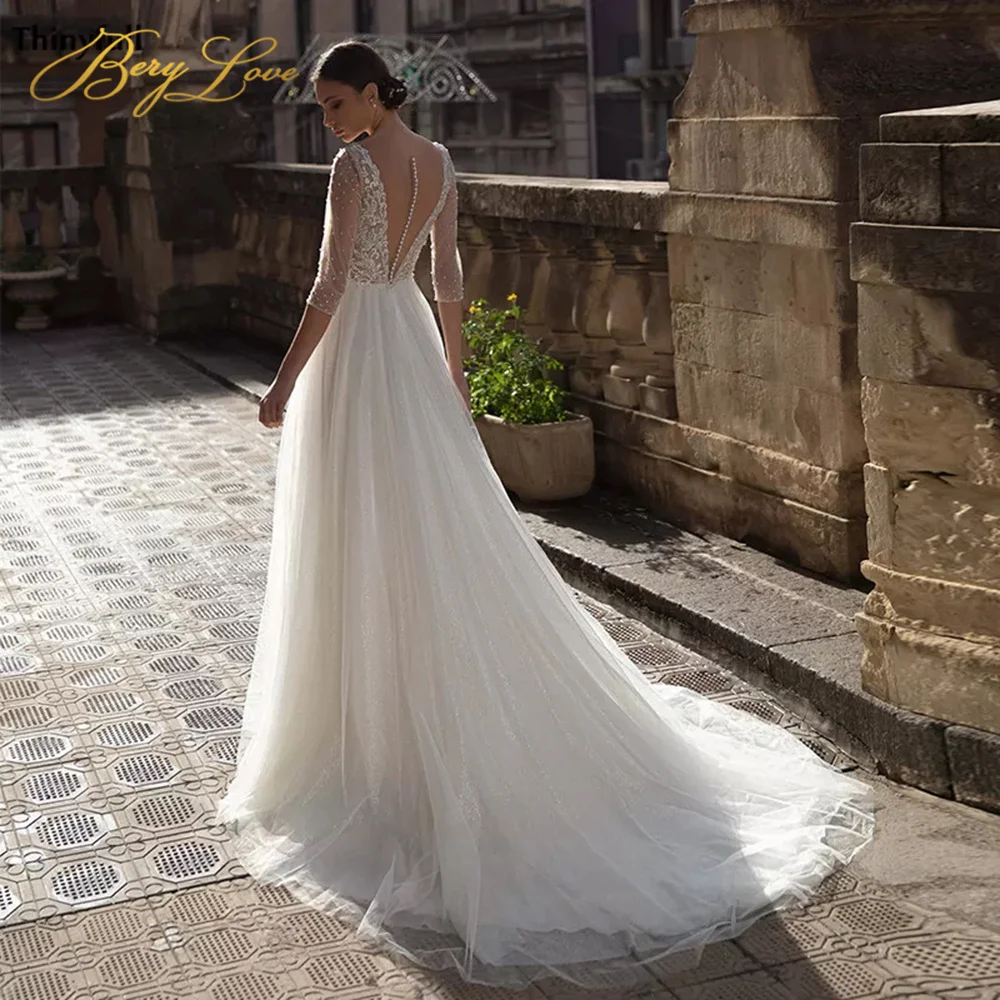 

Berylove White A Line Wedding Gown Appliques Beaded V Neck Sexy Pearls Back Wedding Dress Long Bridal Beach Dress Robe de mariée
