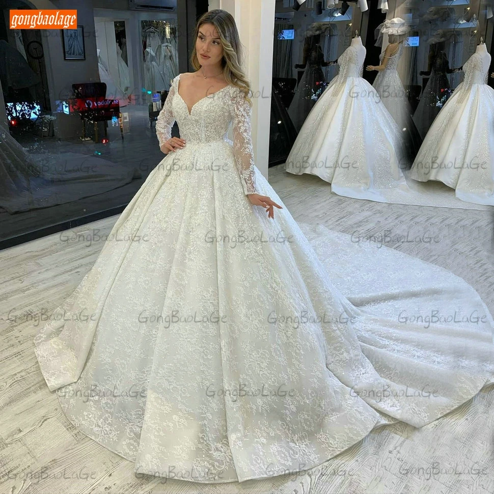 

Luxury Ivory Lace Wedding Gowns Long Sleeves 2021 Abito Da Sposa Beaded Ball Gown Bridal Dresses Chapel Train Vestido Casamento