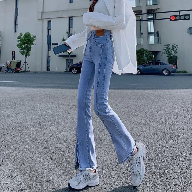 Рваные джинсы для женщин тонкие с разрезом слегка расклешенные новая летняя