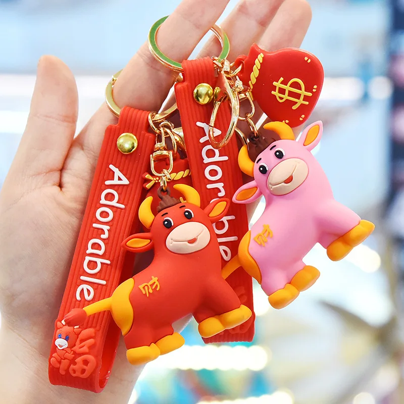 

Креативный брелок для ключей в виде милой куклы в виде скота