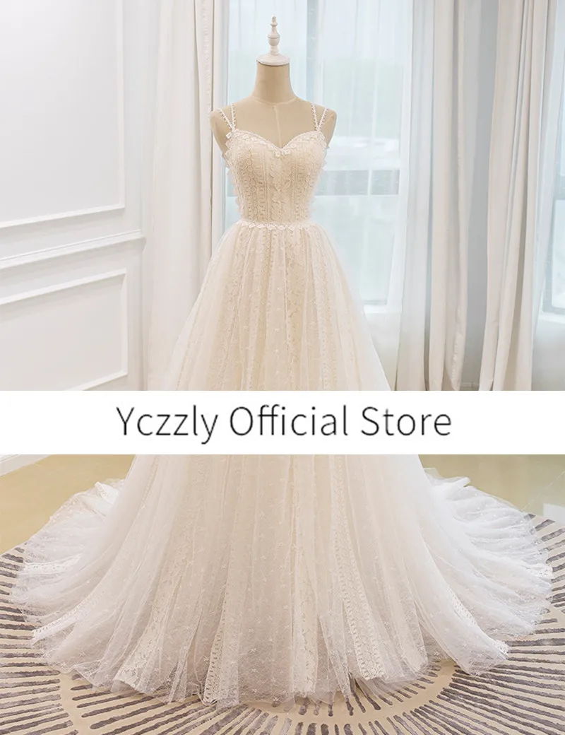 

Romantic Spaghetti Straps A-line Lace Appliques Beach Weddidng Gowns Long Crystal Bohemian Bridal Dress YW331