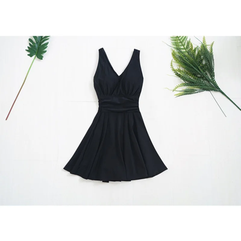

NODELAY Solid Color one piece Swimsuit Women 2021 Slim Skirt Swimwear Female Push Up Bathing Suits V-Neck Spa Swimming Suit