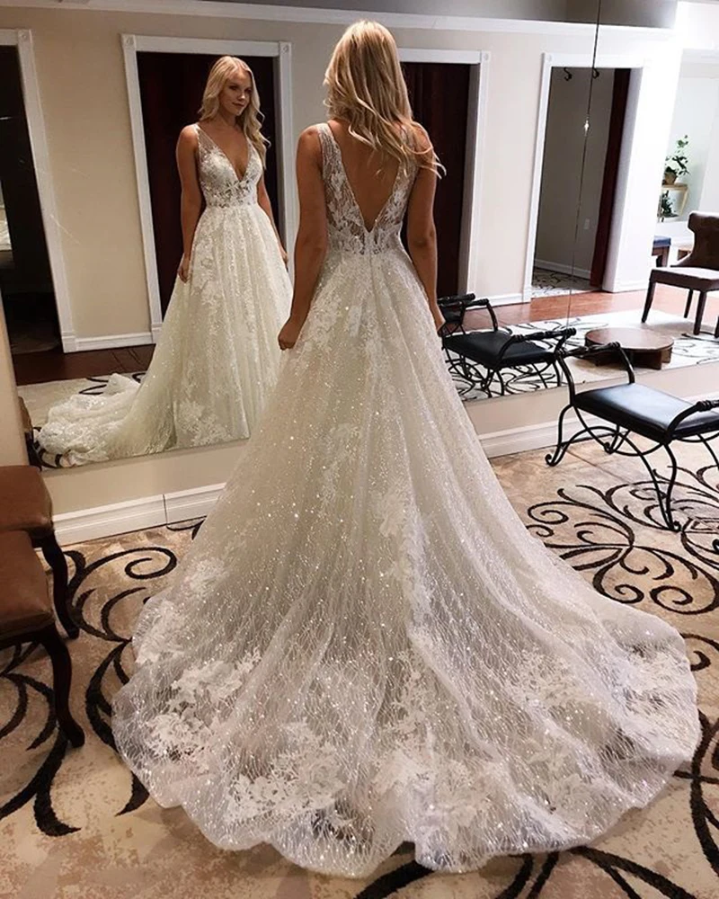 

Gorgeous High Neck A Line Wedding Dresses Sheer Neck Sexy Open Back Bridal Gowns Satin A Line Long Sleeve Wedding Dress