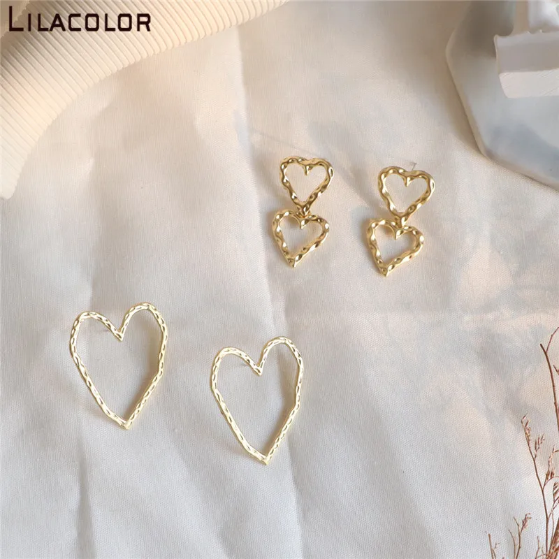 Женские серьги гвоздики золотистого цвета в форме сердца Простые полые