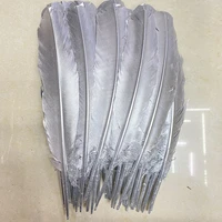 beautiful 100pcslot silver turkey feathers 10 12inch25 30cm christmas craft accessories wedding diy plume
