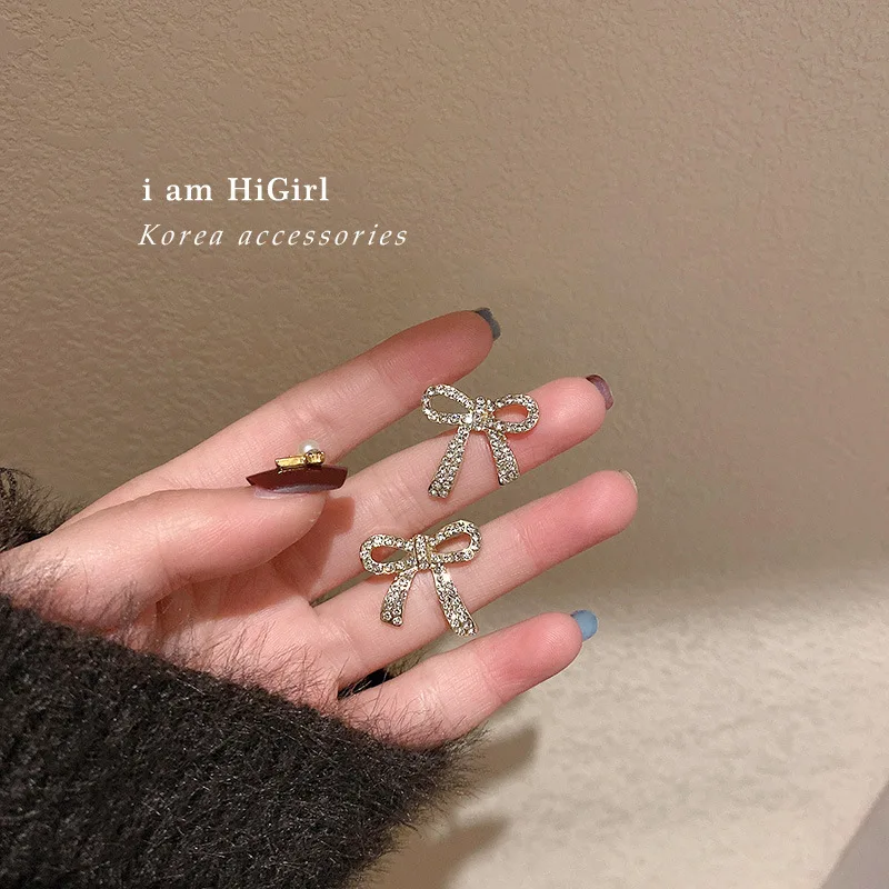 

Korea Dongdamen 925 Silver Needle Fashion Full Diamond Bow Pendant Small Lovely Cold Wind Simple Earrings Female