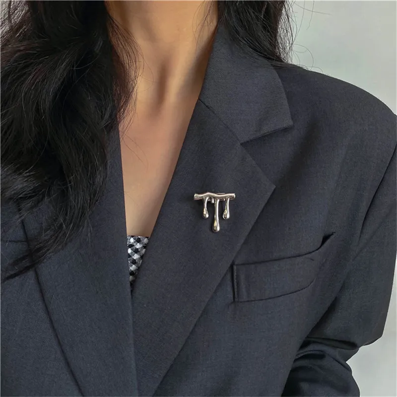 Металлическая нестандартная брошь знаменитость темпераментная личность модные