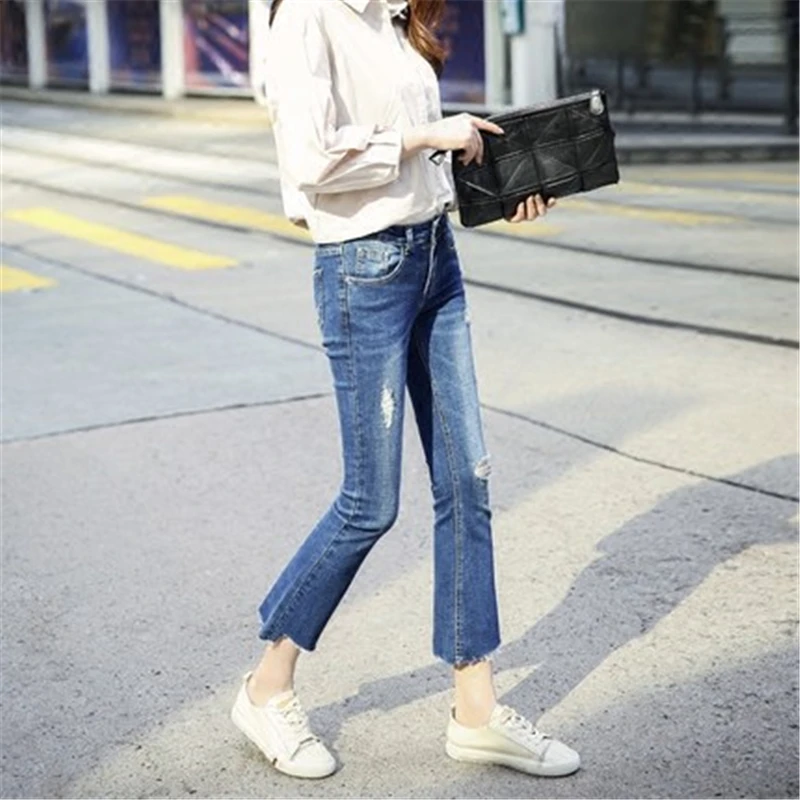 Женские расклешенные джинсы длиной до щиколотки новые модные с дырками и высокой