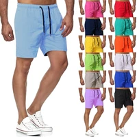 2021 summer 13 color 2021 foreign trade mens five minute speed dry solid color beach pants mens sports fitness shorts