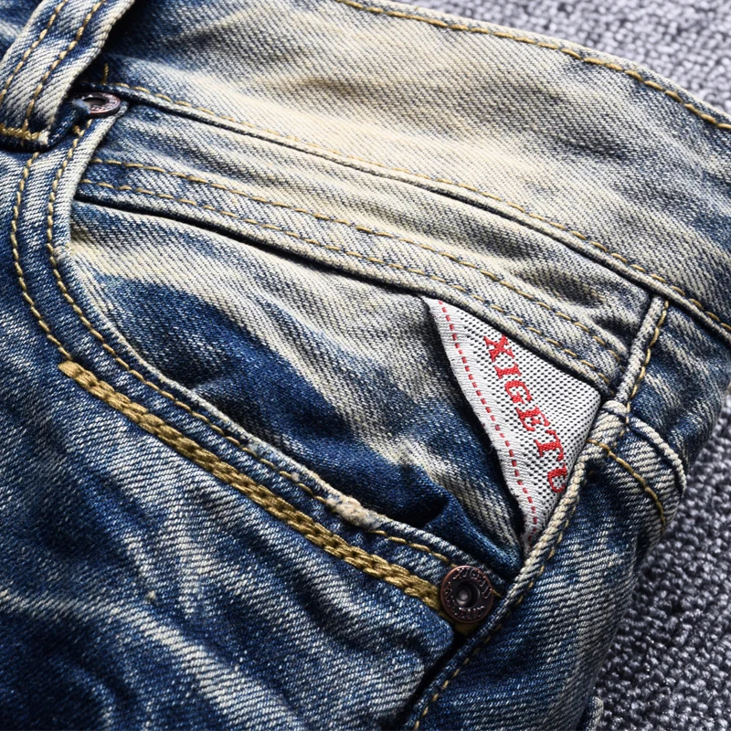 Newly Designer Fashion Men Jeans High Quality Retro Blue Destroyed Slim Fit Ripped Jeans Men Streetwear Vintage Denim Punk Pants