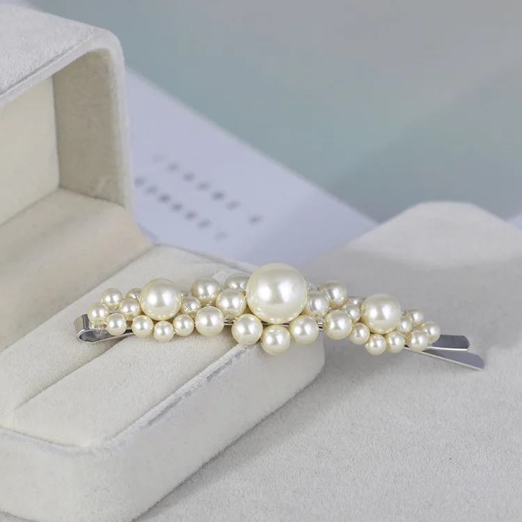 

Fashion flower hairpin texture woven white pearl fringe clip