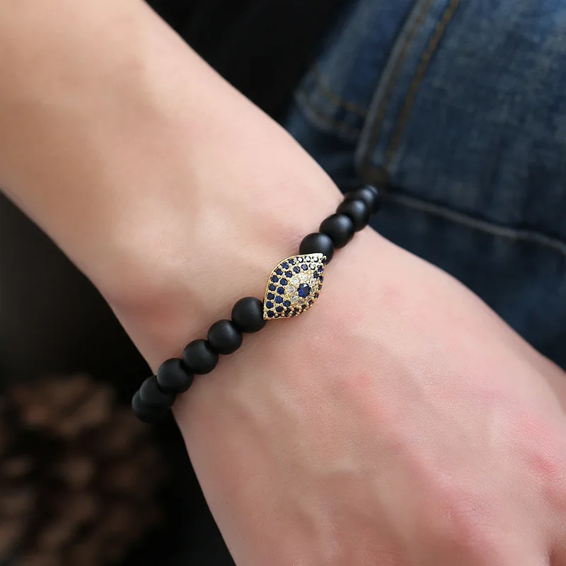 

2019 Charm Copper Micro Inset Zircon Eyes Shape Fashion Elastic Bangle Black Pumice Stone Buddha Beads Bracelet for Women Men