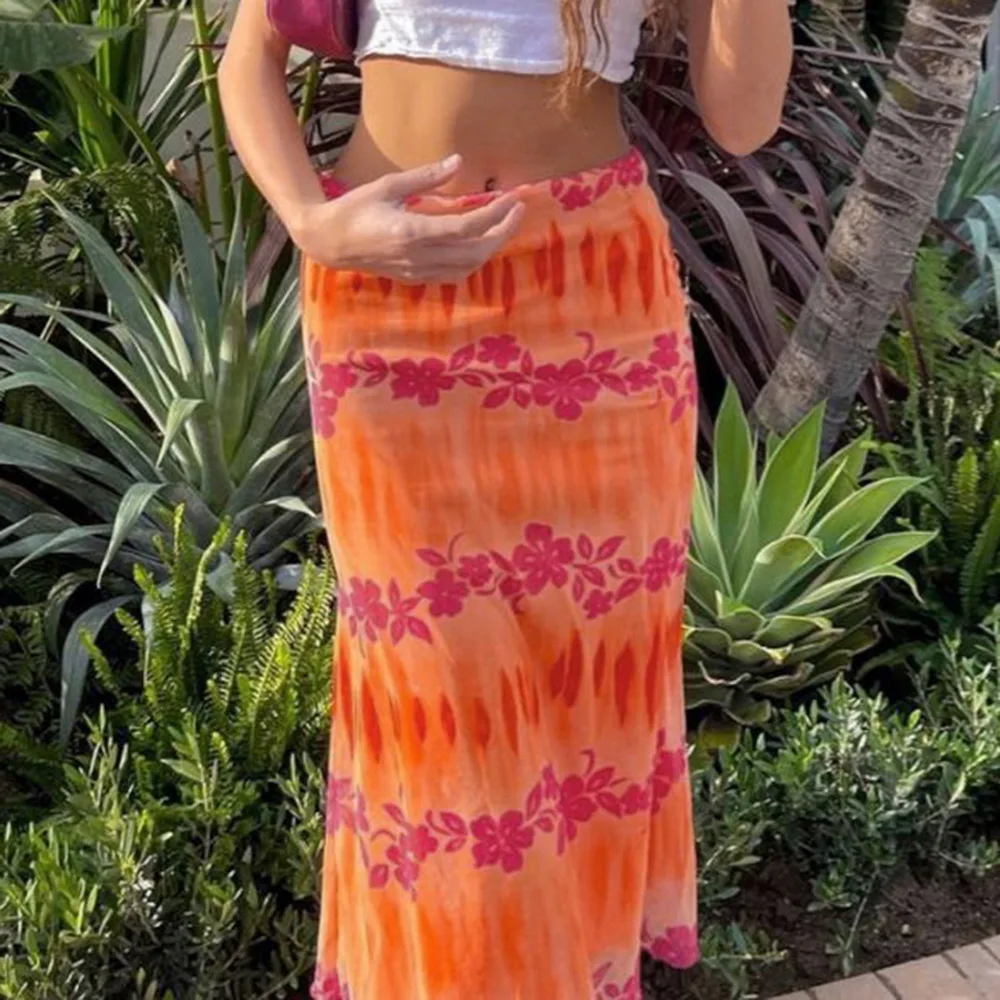 

2021 Women's New Fashion Sexy Orange Bohemian Floral Print Casual Summer Beach Loose Fit High Waist Skirts