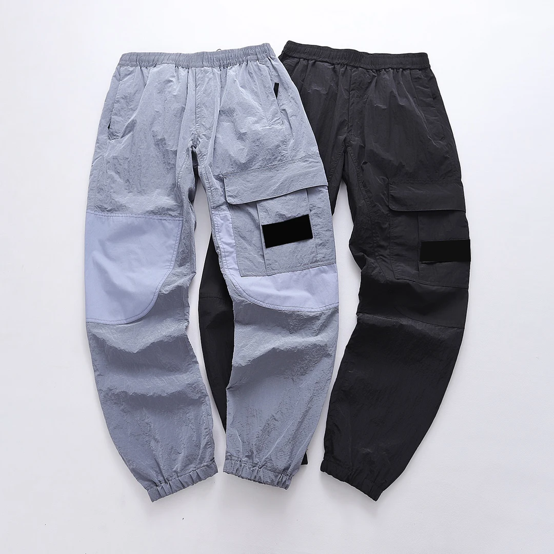 

Men's casual pants metal nylon fabric autumn breathable men jogging plus size pocket men's black silver trousers 31 32 33
