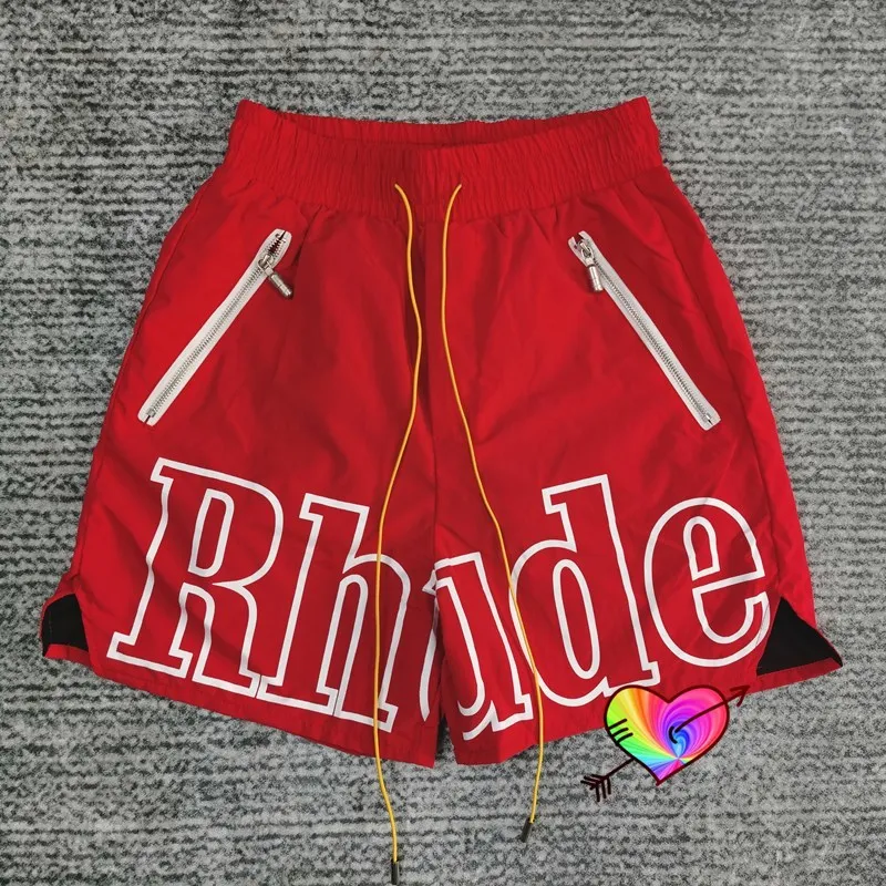 

Red RHUDE Logo Shorts 2021 Men Women PREMIUM NYLON Rhude Shorts TWIN ZIPPER POCKETS EXTENDED DRAWSTRINGS Breeches