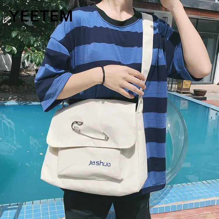 

2020 New pin canvas bag female student messenger bag Korean version of ins personality literary shoulder Messenger bag