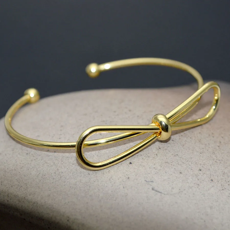 

Classical Bowknot Shape Gold Plating Open Metal Bangles For Women Jewelry 58mm Diameter Women Bracelets 20pcs/lot