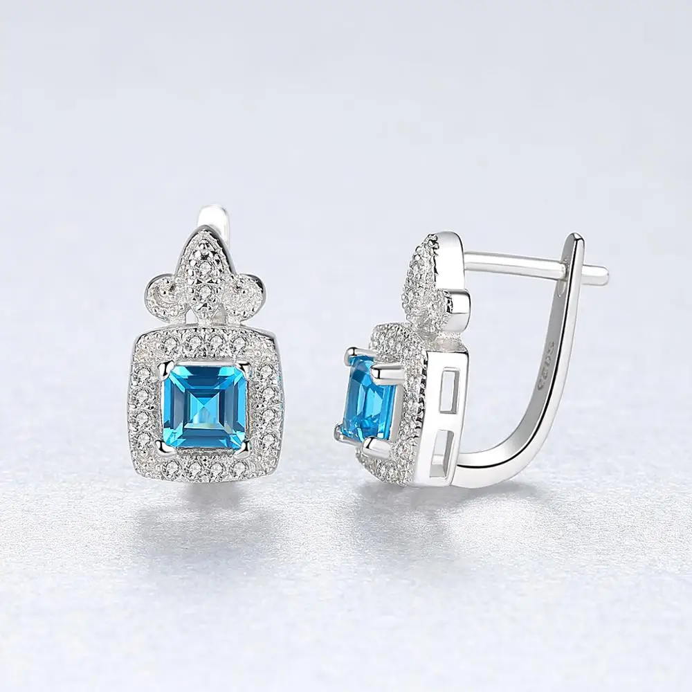 Серьги гвоздики из циркония с морским синим камнем стильные ювелирные изделия