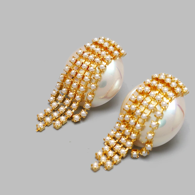 

Golden earrings female summer pearl tassel tea series niche earrings