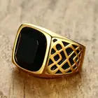 Мужское кольцо с черным камнем и геометрическим узором