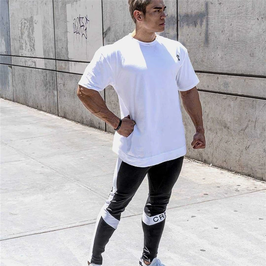Повседневные спортивные брюки Мужские Jogger Спортивные штаны тренажеры фитнес тренировки Брендовые брюки мужские осенние модные хлопковые спортивные штаны