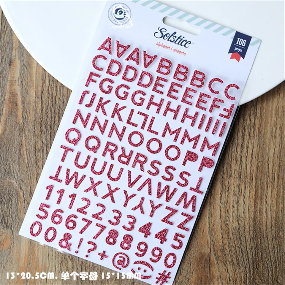 Набор золотистых и серебристых бумажных наклеек в виде порошка высечка для