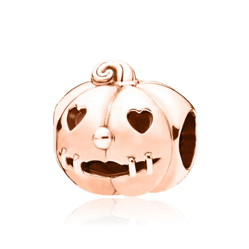 

Женский браслет с подвесками в виде тыквы, сердца и глаз