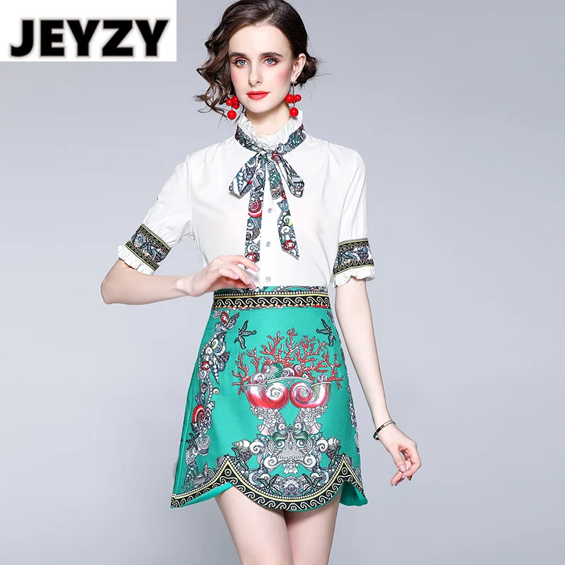 

2021 Summer Fashion Two Piece Set Women Bowknot Ruffled Stand Collar Patchwork White Shirt + Pattern Printed Wavy Mini Skirt Sui