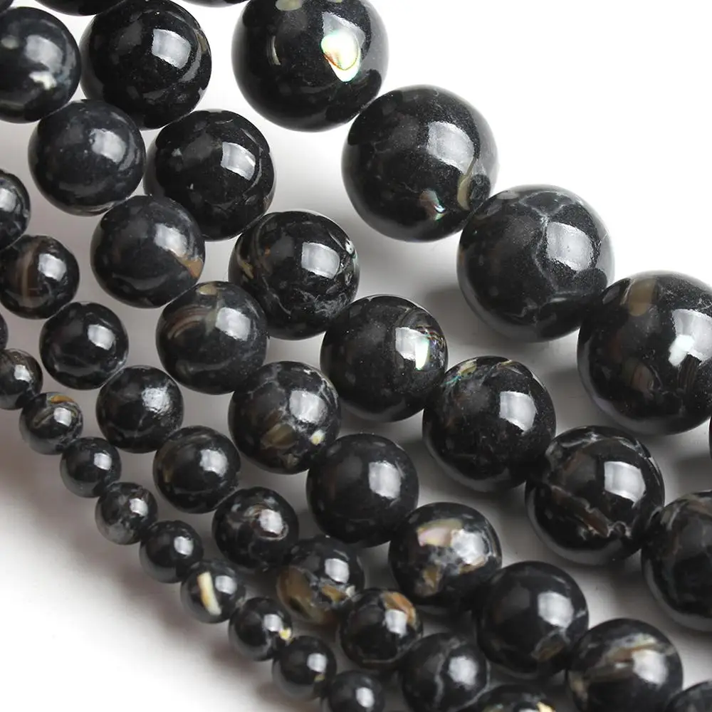 Круглые бусины из натурального черного говлита незакрепленные для изготовления
