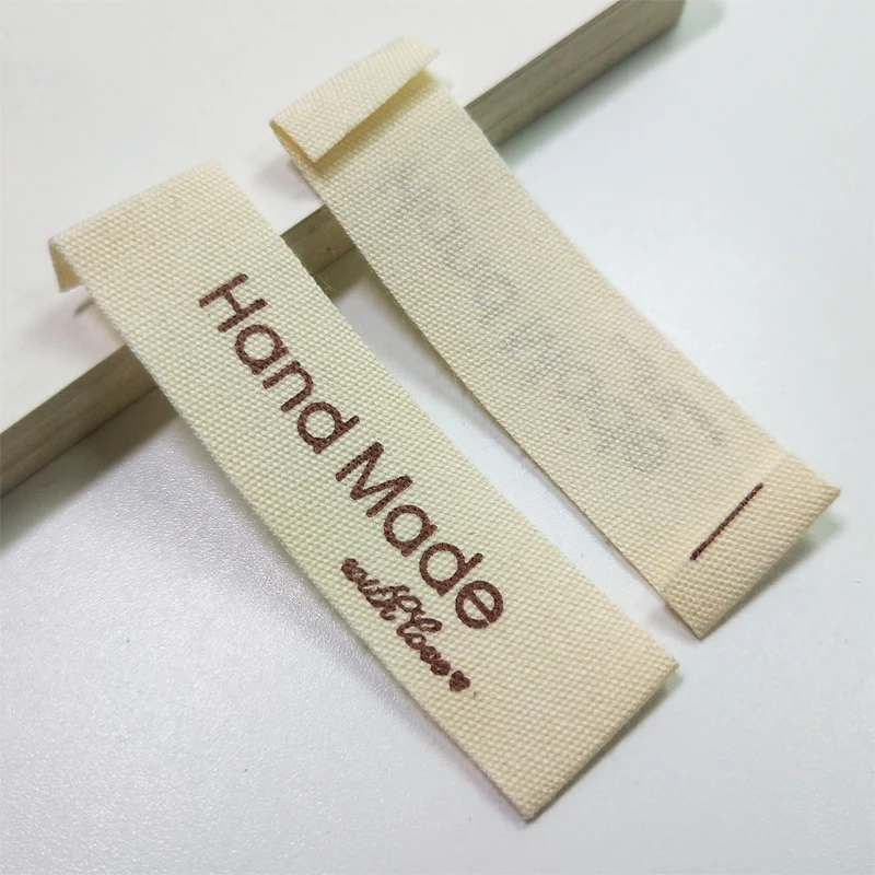 FreeShipping100PCsWhiteHandMadeWithLoveCottonWovenLabelsDIYAccessorySewingGrosgrainClothingLabel|Этикетки для одежды| |
