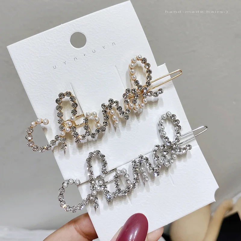 

Hot selling word flashing Korean hairpin hairpin pearl net red new clip top bangs headdress English letter clip hair accessories