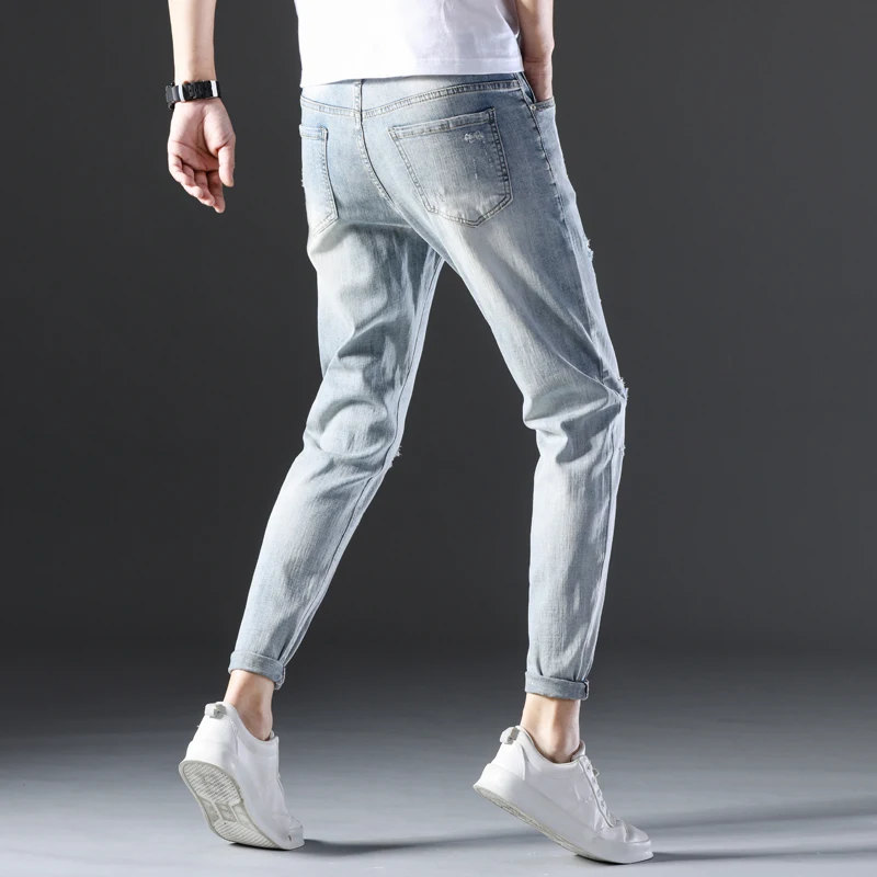 

Новые модные мужские повседневные тонкие и легкие обтягивающие джинсы, брюки в корейском уличном стиле, плотные брюки, однотонные ботильон...