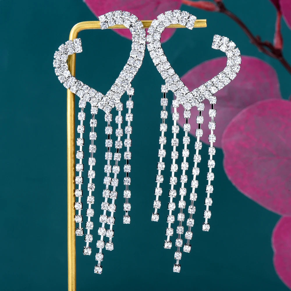 

Женские длинные серьги-кисточки в форме сердца с фианитами