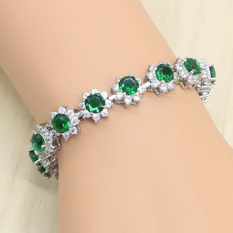 Женский ювелирный комплект из колье серёг и браслета серебристого