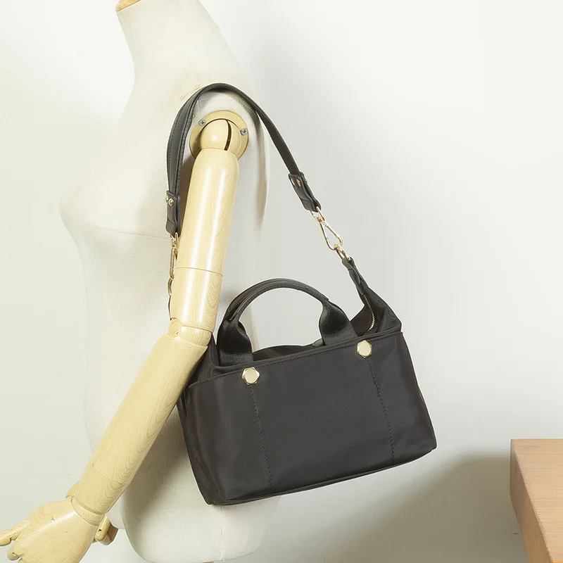 

Women's bag 21 new simple commuting messenger bag women's fashion Longxiang bag leisure one shoulder portable dumpling Tote Bag
