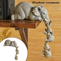 elephant sitter hand painted resin figurines 3 piece elephant mother and two babies hanging off the edge of shelf home ornaments