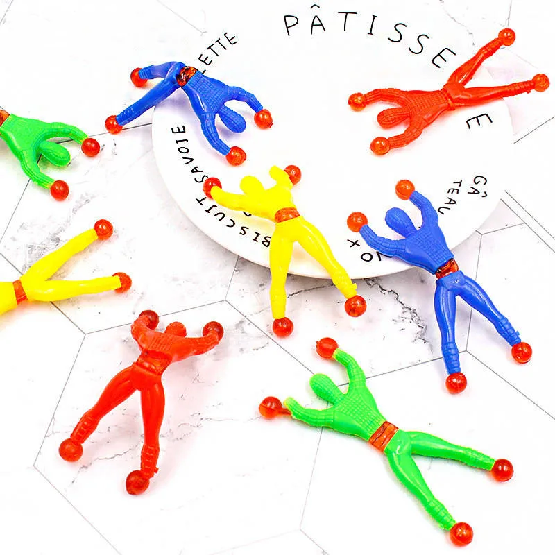 

10PCS/Lot Funny Children Sticky Wall Climbing Toys High Elastic Doors Walls Toys Gift For Kids