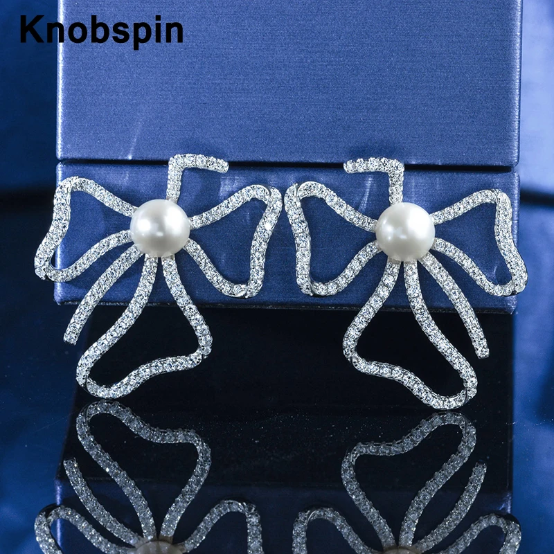 

Knobspin Vintage 100% 925 Sterling Silver 8mm Natural Pearl Inlaid High Carbon Diamond Bow Stud Earrings For Women High Jewelry