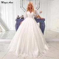 magic awn royal wedding dresses 2022 pearls beaded illusion short puffy sleeves backless a line princess bridal gowns vestidos
