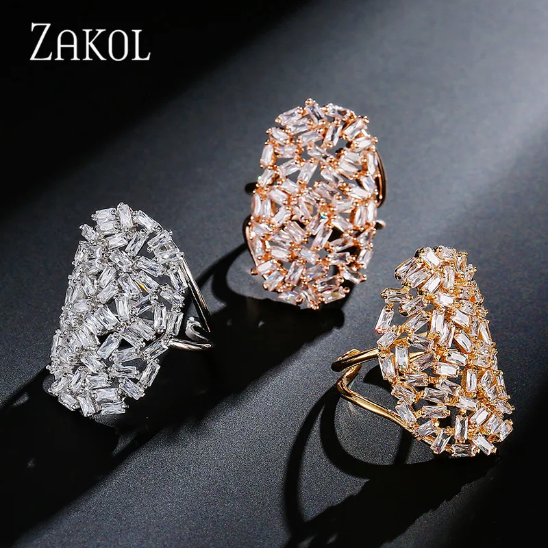 Женское кольцо ZAKOL белое овального цвета с кубическим цирконием AAA вечерние