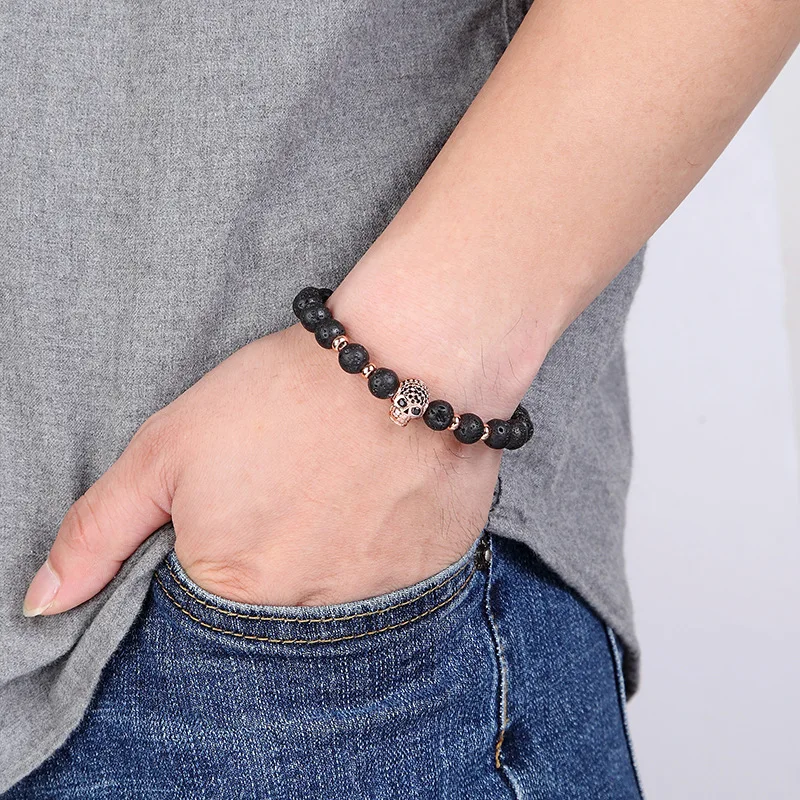 

2021 Luxury Beaded Zircon Skull Men's Charm Bracelet Fashion Lava 8mm Volcanic Stone Elastic Rope Women's Bracelet Wholesale